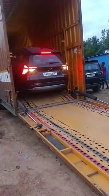 Mahindra XUV700 Unloading on an Axis Car Carrier transport vehicle