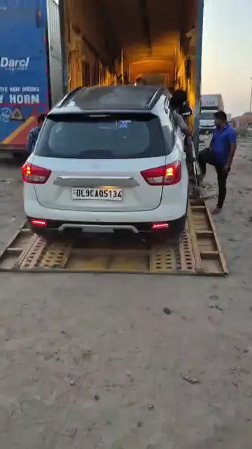 Maruti Brezza Loading on an Axis Car Carrier transport vehicle