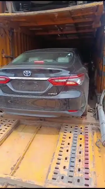 Toyota Camry Loading on an Axis Car Carrier transport vehicle