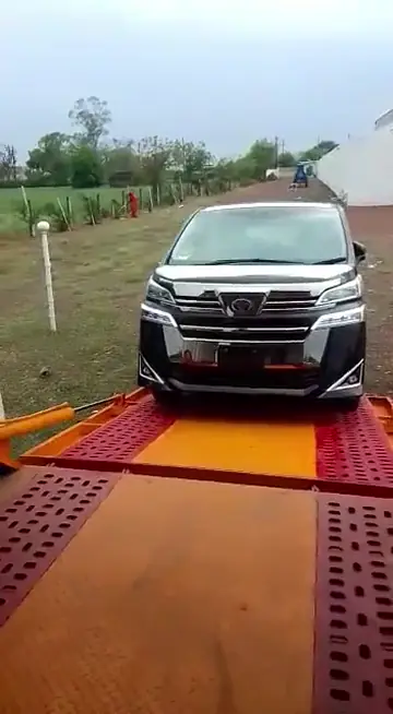 Toyota Vellfire Loading on an Axis Car Carrier transport vehicle